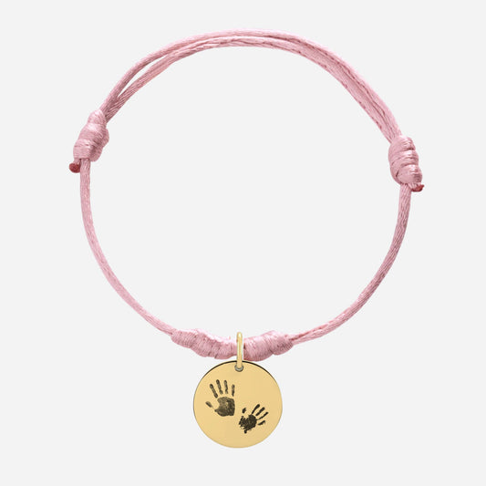 Handprint round disc cord bracelet