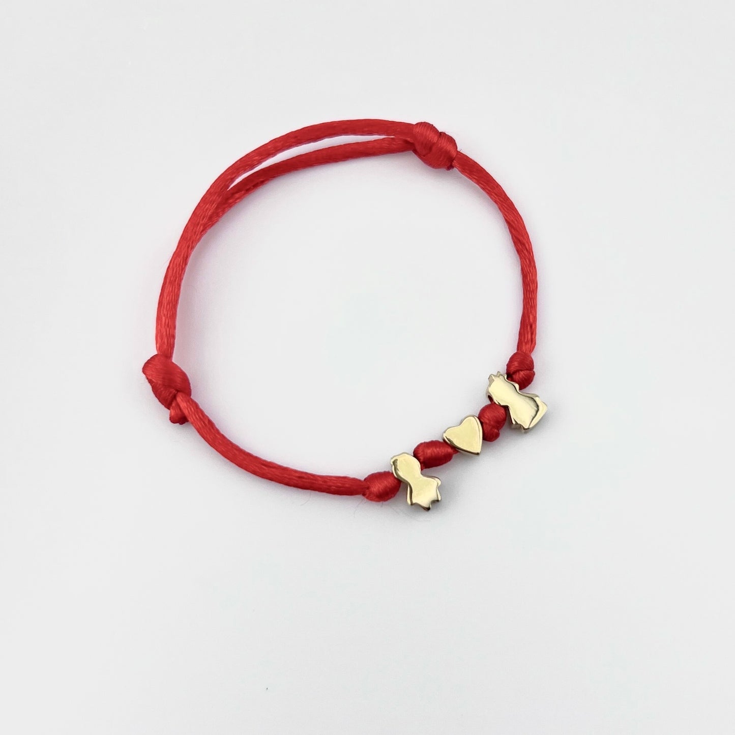 Cord bracelet with kid charms
